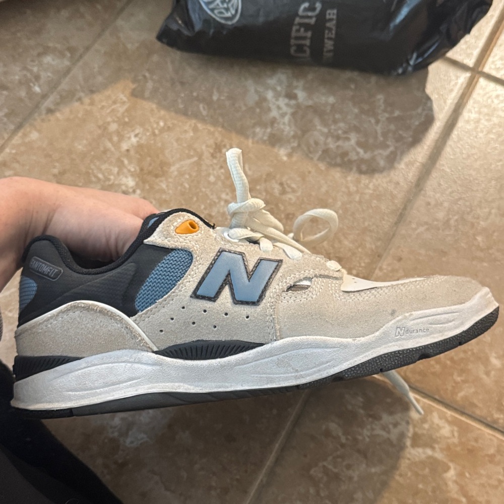 New Balance Cream and Black Sneakers